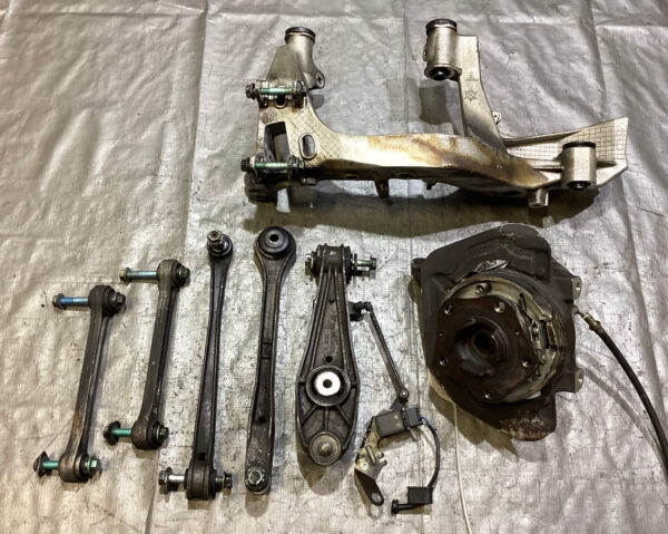 1999-2004 Porsche 996 911 Driver Rear Spindle Hub w/ Control Arms / Subframe Bracket / 87K P6014