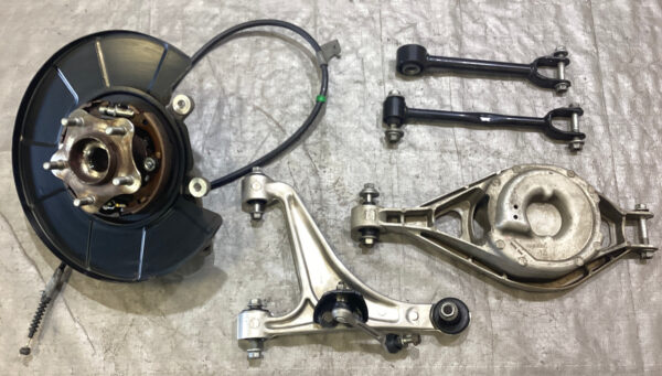 2009-2020 Nissan 370Z Passenger Side Rear Knee Hub w/ Control Arms / 84K 7Z020
